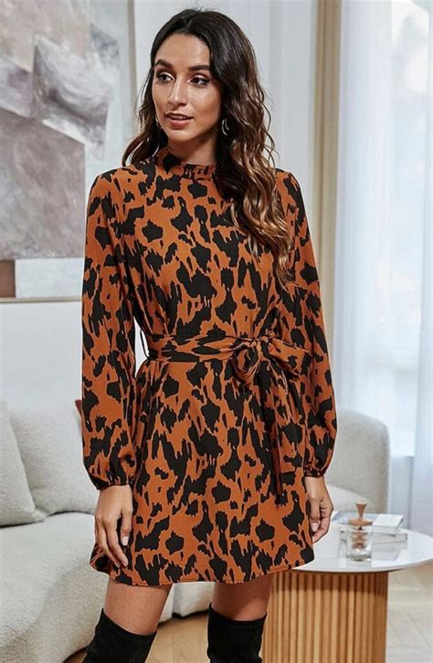 Silent Neck Allover Print Belted Dress Stylobabe