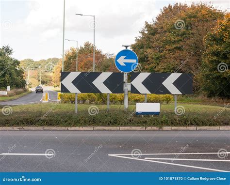 England Road Roundabout Signs Directions No Cars Stock Photo - Image of intersection, sign ...