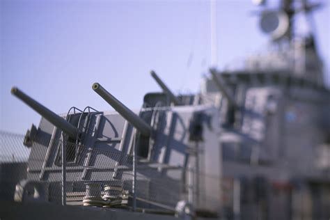 Close Up Of Gun Turrets Pointing Upward On A Naval Battleship