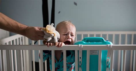 Baby Sleeping In Crib For The First Time