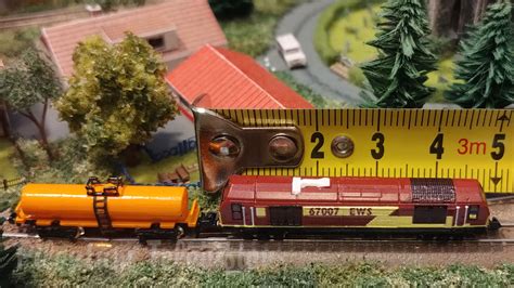 One of the Smallest Model Train Layouts - Micro Model Railroad in T ...