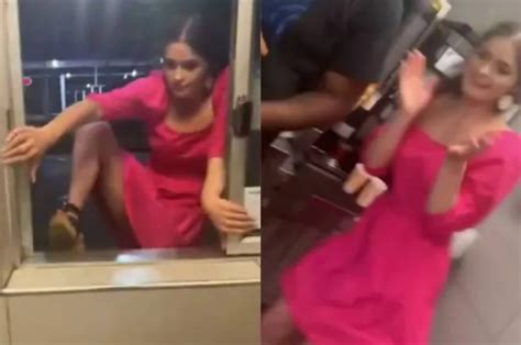 In A Viral Video A Woman Climbs Into A Mcdonalds Drive Thru To Cook