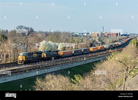 Long Freight Train Pulls Along Track From Washington Dc To Alexandria