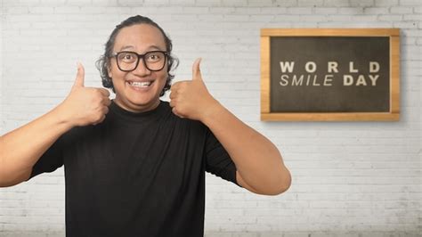 premium photo man showing smile expression happy smile face world