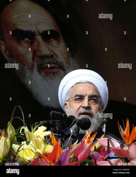 Iranian President Hassan Rouhani Delivers His Speech Under A Portrait