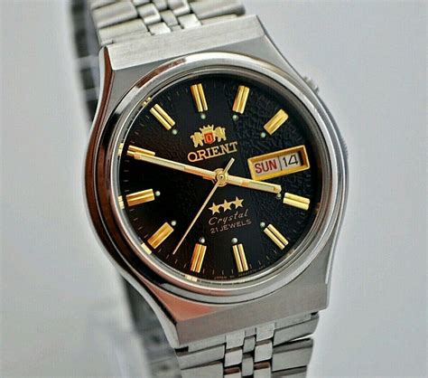 VINTAGE ORIENT CRYSTAL AAA AUTOMATIC 3 STAR DAY DATE MEN S WRIST