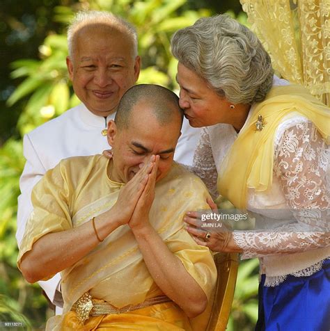 Cambodias New King Norodom Sihamoni Is Kissed By His Mother Queen