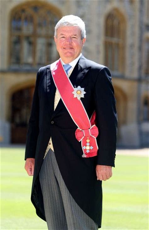 Elegant Knight Adorned With The Order Of The British Empire