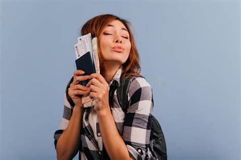 European Model With Nude Make Up Is Blowing Kiss Holding Important Tickets And Card Near His