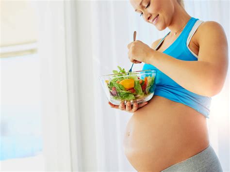 Pregnant Woman Eating Healthy Food