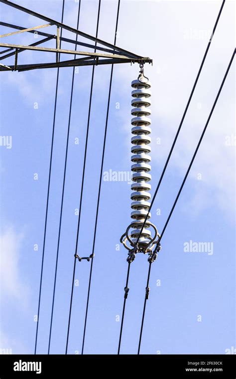 A Cap And Pin Insulator String On A Pylon Carrying High Voltage Cables