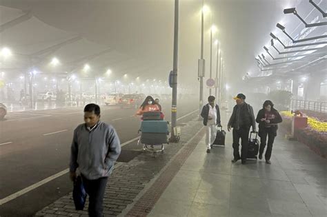 Over 30 Flights 14 Trains Delayed As Dense Fog Engulfs Delhi Reduce Visibility