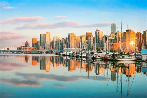 Vancouver skyline with Stanley Park at sunset, BC, Canada - InFocus ...