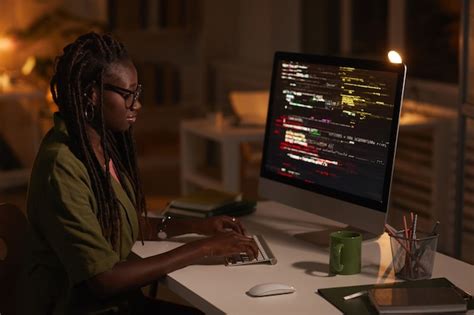 Premium Photo Side View Portrait Of Contemporary African American Woman Writing Code And