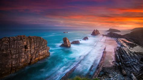 Playa De Portio En Espa A Al Atardecer Fondo De Pantalla K Hd Id