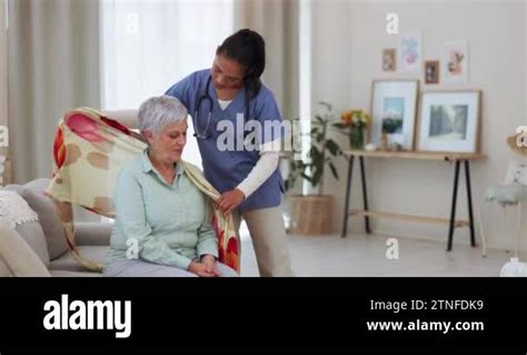 Woman Doctor And Patient In Elderly Care Nursing Or Retirement For