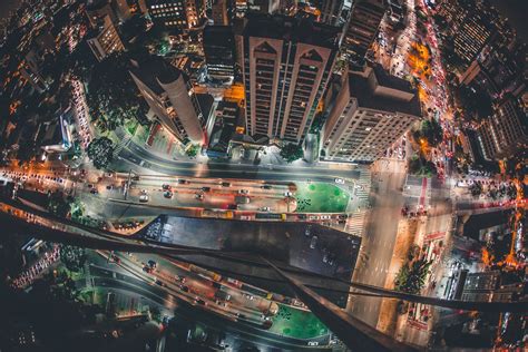 Aerial View Of City Buildings During Night Time · Free Stock Photo