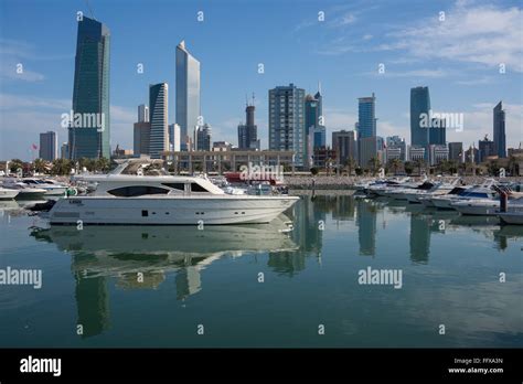 Kuwait City marina in Salmiya with cityscape behind Stock Photo - Alamy