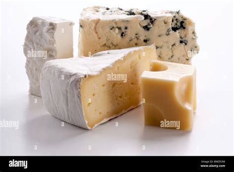 Various types of cheeses on a white background Stock Photo - Alamy