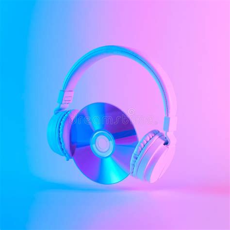 Creative Layout Made Of Headphones With Music Disc In Vibrant Gradient