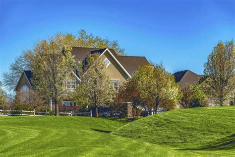 Tan House On Grassy Hill Stock Image Image Of Door Landscape 5248731