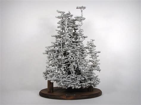 Cast Metal Sculptures Of Fire Ant Colonies That Are Made By Pouring