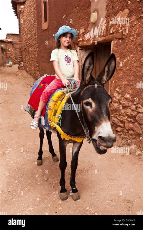 Girl Riding Donkey High Resolution Stock Photography and Images - Alamy