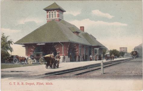 An Old Postcard Shows People Waiting At A Train Station