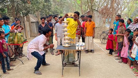 প্লেট গ্লাস সাজানোর আজব খেলায় সবচেয়ে বড় টাওয়ার বানিয়ে শেষ পর্যন্ত