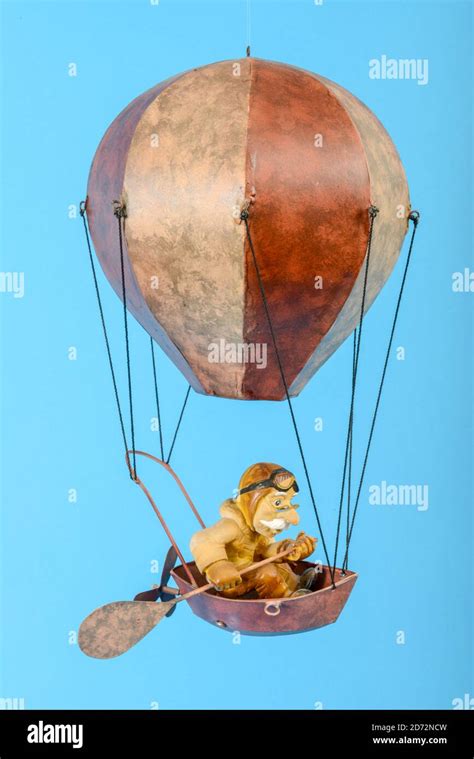 Toy Hot Air Balloon Isolated On Blue Background Stock Photo Alamy
