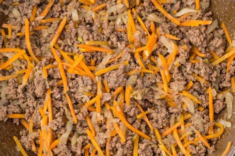 Fried The Minced Meat Onion And Carrot On Frying Pan Stock Photo