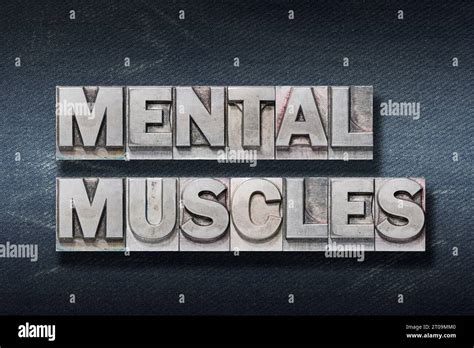 Mental Muscles Phrase Made From Metallic Letterpress On Dark Jeans