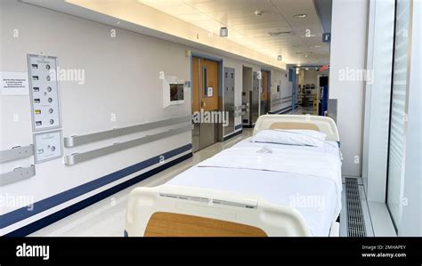 Hospital Setting Operating Room Hallway Hospital Bed And Machines Stock