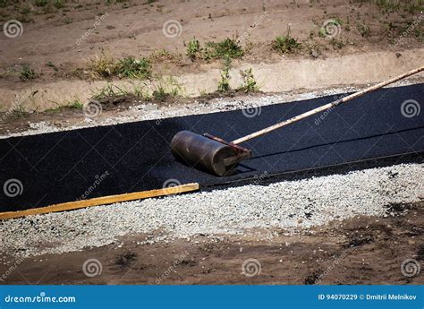 Compaction Of Asphalt On A Path Stock Image Image Of Asphalt Manual