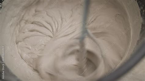 Mixing Plaster Solution In A Bucket Using An Electric Drill Closeup