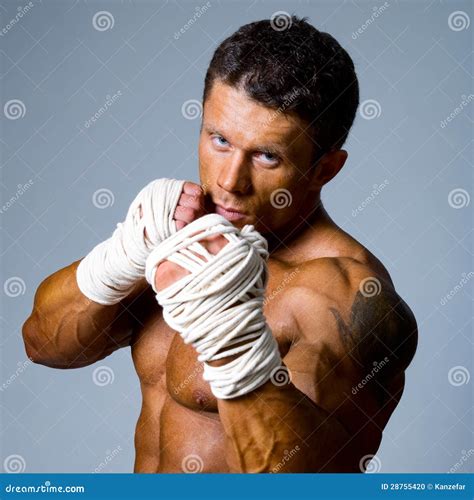 Close-up Portrait of a Kick-boxer in a Fighting Stance. Stock Photo ...