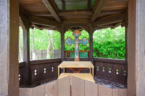 Premium Photo Wooden Church Gazebo With A Religious Cross In The Middle