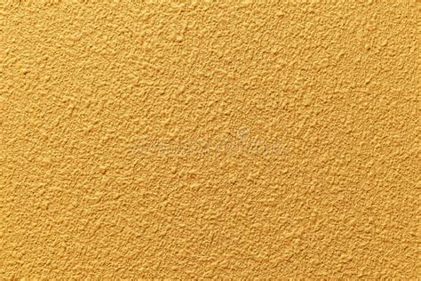 Patterned Yellow Cement Wall Texture And Seamless Background Stock