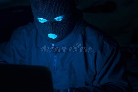 Cybercrime Hacking And Technology Crime Masked Hacker Working In The