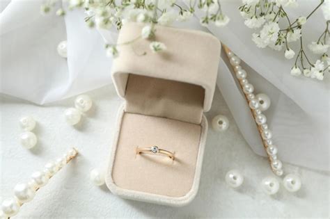 Premium Photo Concept Of Wedding Accessories With Wedding Ring Close Up