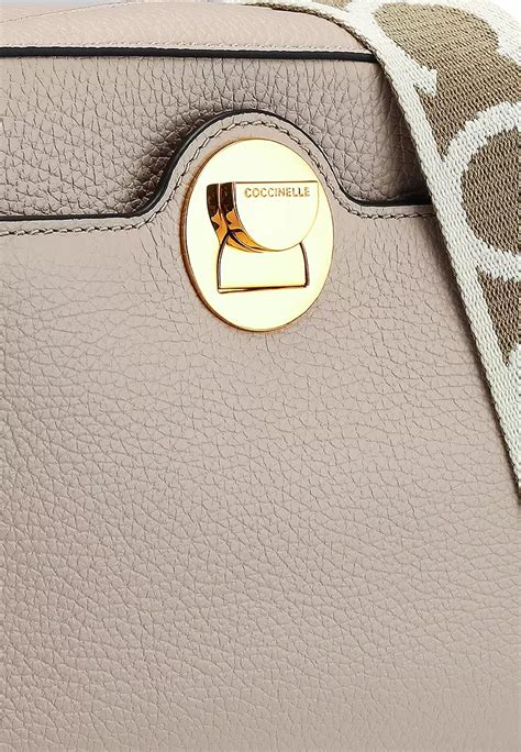 Buy Coccinelle Liya Signature Medium Crossbody Bag Online Zalora