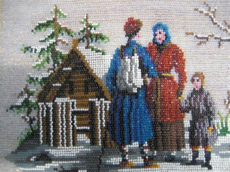 A Cross Stitch Picture Of Three People Standing In Front Of A Small