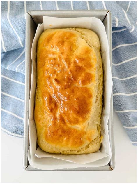 A Loaf Of Bread Sitting In A Box On Top Of A Table