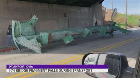 Piece of old 74 bridge lands under Arsenal Bridge | wqad.com