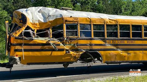 School Bus Rear Ended By Tractor Trailer Bus Spun Around 180° Slamming Into Rock Bluff