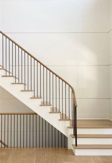 Curved wood handrail in 2024 | Modern staircase, House staircase, Staircase railing design