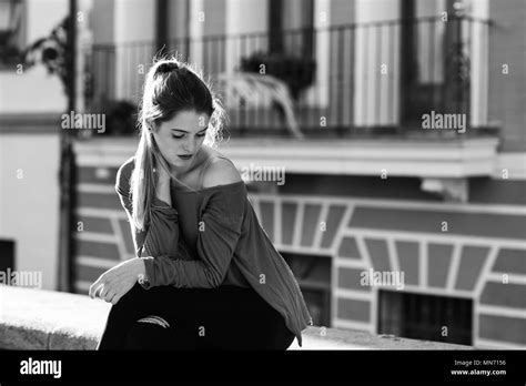 Portrait Of Happy Blonde Girl Wearing Casual Clothes In Urban