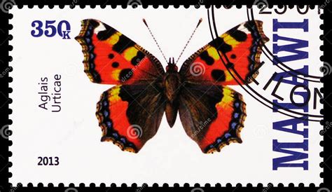 Postage Stamp Printed In Malawi Shows Aglais Urticae Butterflies Serie