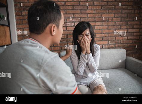 Young Man Comforting Crying Sad Woman Caring Husband Showing Empathy