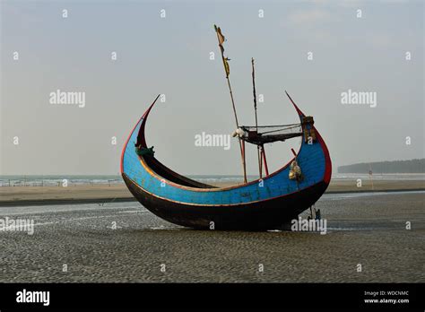 The Traditional Fishing Boat Sampan Boats Moored On The Longest Beach